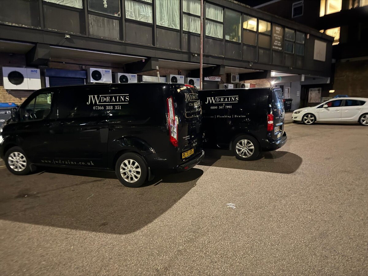 JW Drains branded service vans